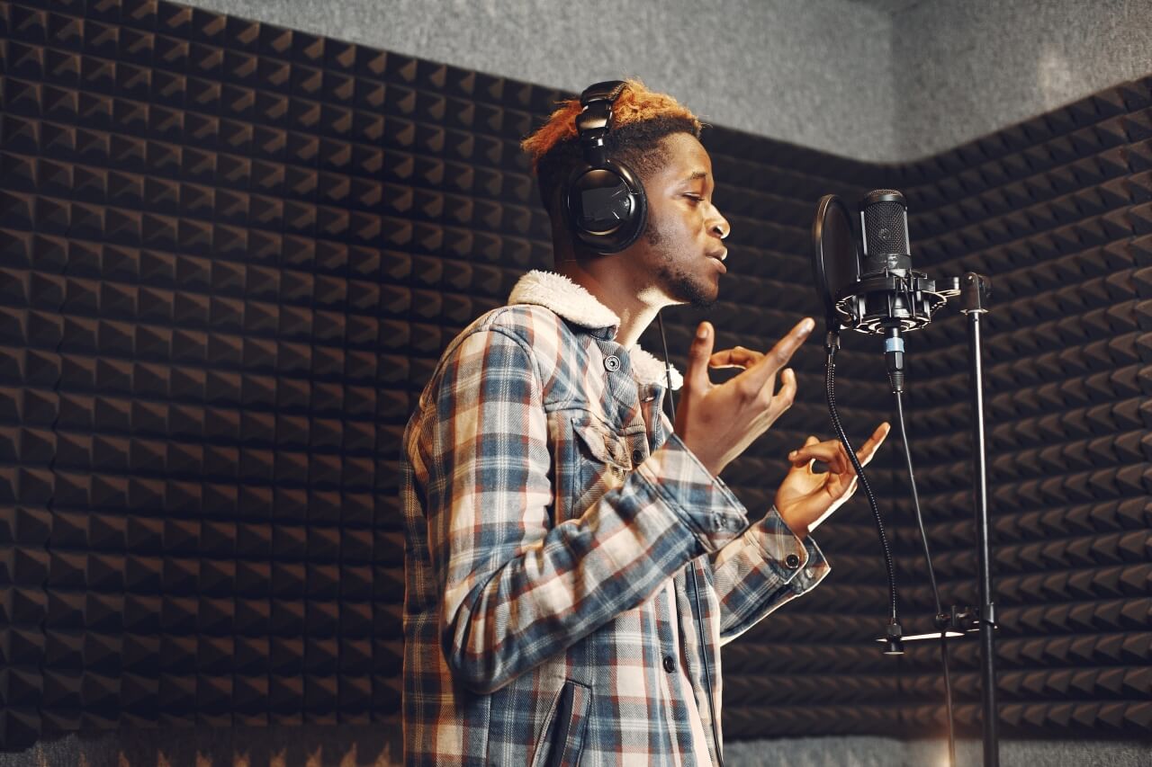 Rapper in recording studio - inspiration for artist name generator